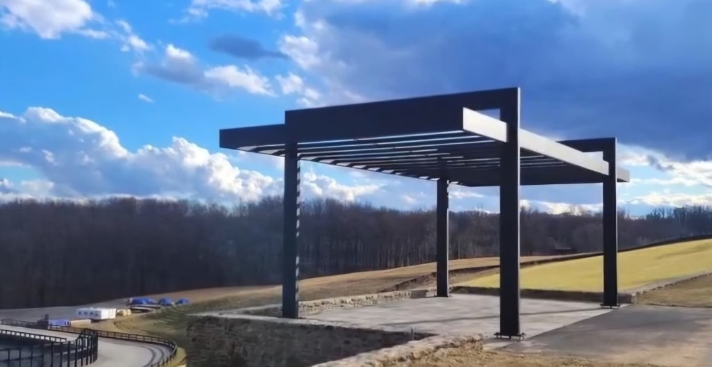 Custom aluminum pergola overlooking a hillside
