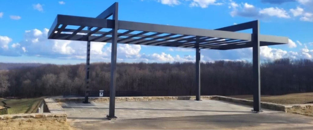 Wide view of a custom aluminum hillside pergola